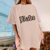 T-shirt feminina Mulher Camista de Moda Oversized Crew Longe Pescoço curto Tops de verão Tops de estampa vintage Streetwear Top Top Extra Lo