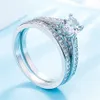 Ensemble de bagues pour amoureux de fiançailles de mariage de luxe Bling Iced Out géométrique AAA bague en cristal de Zircon cubique pour Couple