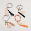 Factory direct selling beaded wooden bead bracelet keychain personalized wood chip tassel pendant multi-color optional