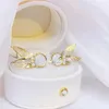 Clip-on schroef terug Koreaans delicate holle vlinderontwerp Pearl transparante oorbellen 14K echt goudplateren elegant voor vrouwen prachtige ea
