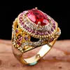 Anneaux de mariage Magnifique grand anneau de pierre rouge ovale de luxe rempli de mariages CZ pour les femmes de fiançailles bijoux de mode cadeaux Anillos Mujer Rita22