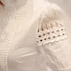 女性用ブラウスシャツマヌボー女性ホロースリム長袖ホワイトシャツレースフックフラワープラスサイズS-5XLオフィスワークブラウスウーマン