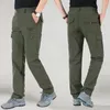 Mens Tactical Pants Flera fickelasticitet Militär Urban Tacitcal byxor män Slim Fat Quick Dry Cargo Pants 5xl 220706