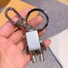 Porte-clés porte-clés stéréo astronaute espace robot lettres mode métal porte-clés pendentif accessoires emballage d'origine
