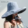 Mujeres de verano Moda de doble cara ancha Sombrero para el sol de ala grande Gorra de pescador de playa al aire libre Sombrero con protección solar a prueba de rayos UV Sombrero de cubo 220519319U