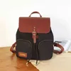 Double Umhängetasche Frauenjahr Neues leichtes Leichtgewicht einfacher Frauen -Rucksack vielseitiger Mode Travel Multi -Pocket Schoolbag große Kapazität