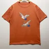 Erkek Tasarımcı T Shirt Kadın Üst Taçlandırılmış Vinç Harfleri Baskılı Tee Yaz Tshirt Sıradan Hip Hop Kısa Kollu Kaya Sokak Giyim Mürettebat Boyun Pamuk Üstler Ins Artı Boyut Beyaz