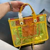 Strandquer Jelly -Taschen Umhängetasche transparent große Totentasche Lady Clear PVC Handtaschen Crossbody Geldbörse Hardware Buchstaben Kette Mode echte Leder Schultern Gurt