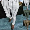 男性のための秋のビジネスカジュアルストライプの印刷された鉛筆のズボンは男性中腰部の街路壁のファッション男性のスリムズボン220323