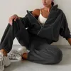 Pantaloni da donna a due pezzi da donna gomanper da donna per pista casual da donna autunno autunno e inverno con cappuccio di colore solido alla moda