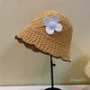 Diseñador Summer Lady Beach Cap Hierba Trenza Sombrero con encaje de flores Diseñadores Gorras Sun Hollow Sombreros transpirables