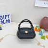 Nieuwe snoepkleur mini kindertas mode Koreaans draagbare kleine vierkante zak buitenlandse stijl eenvoudige ins single schouder messenger