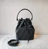 Tasarımcılar Drawstring Çantalar Mini Tote Kadın Lüks Kova Çantası Handel Çantalar Tuval Toraması Kadın Lady Messenger Çanta Çantası Zincir Omuz Çantası Vintage Sacoche