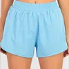 LU-0260 Marca Roupas de Yoga Femininas Shorts Calças Curtas para Exercícios com Bolso com Zíper Roupas Fitness para Meninas Correndo Calças Femininas Elásticas Roupas Esportivas