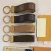 Klassisk brun blomma plånbok nyckelring högkvalitativ rostfritt stål läder nyckelringar designer väskor hänge tillbehör2195