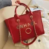 70% Factory Outlet Off Borse da donna Borsa da sera in metallo con distintivo Tote Bag Piccola borsa da spiaggia in pelle a tracolla Borsa grande portafoglio a catena femminile Zaino in vendita