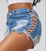 Short féminin Summer Tassel Denim fête Rave Femmes Sexy Club Skinny Lace Up Mid Waist Hole Rivet Button Black Short Jeans