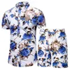 Tute da uomo Set di abbigliamento da uomo 2022 Abbigliamento da spiaggia estivo in due pezzi Camicia e pantaloncini casual con stampa floreale Abiti da vacanza hawaianiUomo