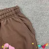 Calça de moletom de tecido pesado marrom Young Thug Spider 2022 masculina e feminina calça Sp5der hip hop rosa 3D estampada em espuma 555555