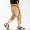 Listrado listrado Sortpa -pólica masculina calça de jogger masculino de streetwear de moda calça calças de harém de harém solto 220621