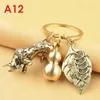 Keychains Brass Gourd Key Pendant Emperor Jiuzi Dustpan Small Keychain Leaf Pixiu Car Chain Chinese Feng Shui AntiqueKeychains Emel22