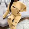 Fashion New Zipper Hollow Out Set Set Set осень-зимние женщины Элегантные вершины O-образного выявления и повседневные брюки Ladies Streetwear Suits T220729