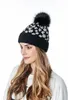 Knittad hatt europeisk och amerikansk leopard tryck kvinnor vinter varm mössa hatt vintage fuffy pompom manschetter skalle mössa