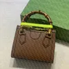 2023 Diseñador de lujo Bolso de compras Diana Bamboo Bolso de cuero genuino de calidad superior Mujeres hombres tote crossbody moda shoppingbag billetera bolsillos para tarjetas