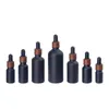 Bouteille Cosmétique Vide Gel Noir Épaule Ronde Bambou Collier En Bois Frost Top Récipient Rechargeable Flacons D'huile Essentielle 5ml 10ml 15ml 20ml 30ml 50ml 100ml