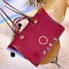 Bolsas femininas luxuosas Bolsas de praia Designers Metal Letter Badge Tote Bolsa de noite Bolsa de couro de corpo pequeno Bolsa de corrente feminina grande Mochila YDZO 50% Liquidação