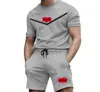 Mens Fashion Leisure Tracksuits Summer Suits T Shirt Seaside Holiday Shirts Shorts Sets Man Women Luxury Set Outfits Sportswears