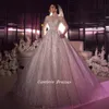 Crystal Sparkly Pearls Long Sleeve Dubai Wedding Dresses Ball Gown Illusion Open Back Pekadning PEBSININERAD SAUDI ARABISK BRIDALKOBLER S S S S S S S S S