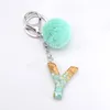 Pompom Letter Pendant Keychains Nyckelkedjor Holder för kvinnor Söt bil Akryl Glitter Keyring Charm Par Bag Charms gåvor