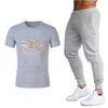 Stilista estivo Tute da uomo Completi da camicia Pantaloni da basket Set da uomo Maglietta casual Pantaloni da jogging Top Palestre Fitness Pantaloni sportivi Abbigliamento uomo