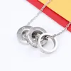 Mode Femmes Hommes Amour Collier Designer Bijoux Chaîne En Or Avec Pendentif Double Anneau Plein CZ Deux Rangées Diamant Pendentif Octogonal Bouchon À Vis Couple Cadeau