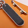 Porte-clés de Skateboard en acier inoxydable, marque créative, accessoires pendentif marron et noir avec boîte 949A