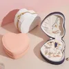 Portable travel jewelry storage box creative heart-shaped PU leather display stand necklace earrings ring box desktop ornaments