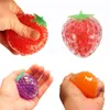 Fidget Toys Descompressão Extrusão Dedos Toy TPR Fruta Uva Tomato Pineapple Merquilhos Bolsa de bolha macia Beliscando música Ansiedade de ventilação de ventilação