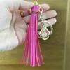 Nyckelringar Simple Luxury Tassel Fringe Pu Leather Keychain Purse Bag Buckle Handbag Pendant For Car Keyring Holder Kvinnor smycken Llavero Enek