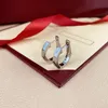 قرط جديد شهير من الفولاذ المقاوم للصدأ مقاطع مع الماس الكامل للأم والنساء حلق المجوهرات بدون صندوق H1