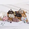 Klassisk tryckt myntväska pu läder nyckelring med tofs bärbara mini plånbok förvaringspåsar modedesigner väska charm hänge 7 färger lov
