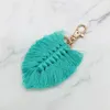 Bohemian Beach Style Party levererar handvävd bladknapp Keychain Pendan