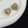 Vintage perle amour charme boucles d'oreilles Designer Double lettre gouttes femmes élégant goujons acier joint boucle d'oreille