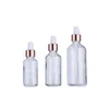 Flacons compte-gouttes en verre de sérum transparent, vente en gros, 5ml, 10ml, 15ml, 20ml, 30ml, 50ml, 100ml, avec couvercle en or rose, pour huiles essentielles, SN4517