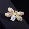 Spille Spille Moda Piccolo Simpatico metallo placcato oro Risvolto ape per le donne Lusso di alta qualità Scintillante Cubic Zirconia Insetto Spille Spille