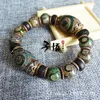 Beaded Strands tillverkare grossist original tibetanska antika gröna treögda DZI-pärlarmband armband diy distans smycken grossist. Jag