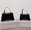 Hot Lady Shopping 2022 bolsas Bolsas de moda Mulheres ombro de alta qualidade Cross Cross Luon Lugar Luxury couro genuíno clássico retro