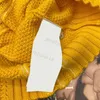 Желтые вязаные свитера женщин полоска кармана карман карман