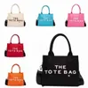 Totes Bag Tote Designer Väskor handväska axel kvinnor mode koppling casual duk handväskor sommar damer crossbody brev tryck plånbok 220511