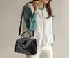 Högkvalitativ rivet läder kvinnors väska handväskor lyx varumärke kedja Tassel Totes mode kvinnliga axelväskor avslappnad messenger väska